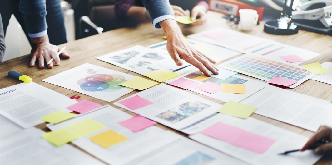 Paper on Table with sticky notes